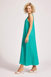 A model wearing the Miramar Linen Tank Maxi Dress in colour Lagoon (Green), from the front, showing the whole outfit