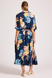 A model wearing the Parisio Belt Shirt Dress in colour Indigobloo, from the back