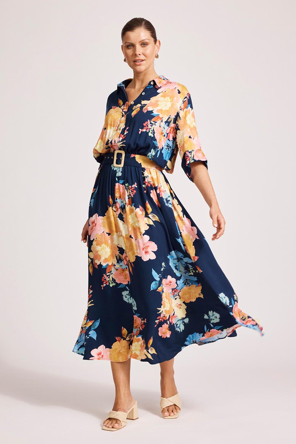 A model wearing the Parisio Belt Shirt Dress in colour Indigobloo, from the front, showing the whole outfit