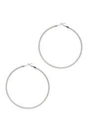 Product shot of the Pena Simple Hoop Earrings in colour Silver (Metallics), from the front