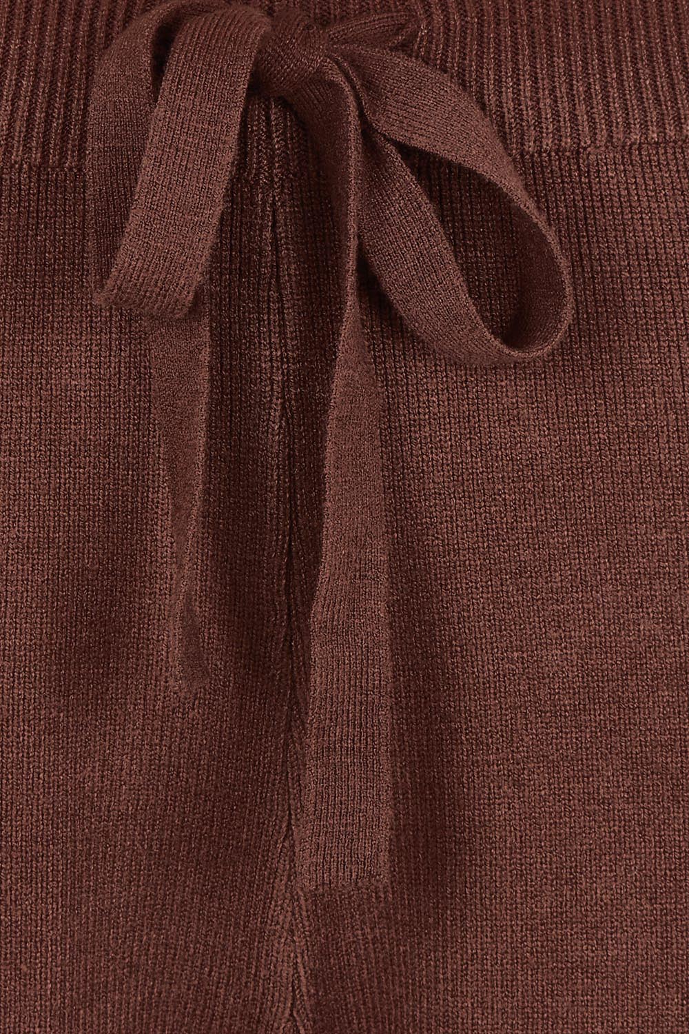 Product shot of the Samira Knit Pant - Mahogany in colour Mahogany, showing detail
