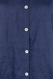 Product shot of the Studio Linen Button Top Jacket – Navy in colour Navy, showing detail
