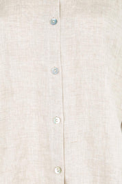 Product shot of the Studio Linen Button Top Jacket – Tusk in colour Tusk, showing detail