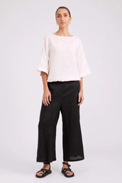 Model Genericm wearing size sample of the Studio Linen Button Top Jacket – White in colour White, from the front