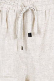 Product shot of the Studio Linen Bermuda Short – Tusk in colour Tusk, showing detail