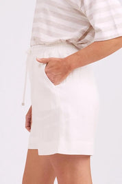 Model Genericm wearing size sample of the Studio Linen Bermuda Short – White in colour White, from an angle