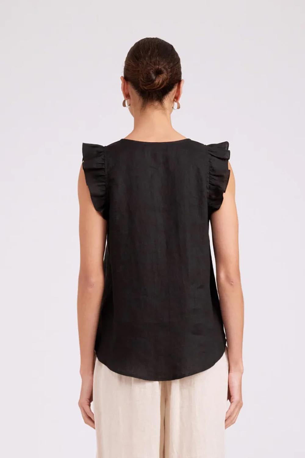 Model Genericm wearing size sample of the Studio Linen Frill Tank – Black in colour Black, from the back