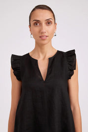 Model Genericm wearing size sample of the Studio Linen Frill Tank – Black in colour Black, in a cropped view