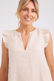 Model Genericm wearing size sample of the Studio Linen Frill Tank – Tusk in colour Tusk, in a cropped view