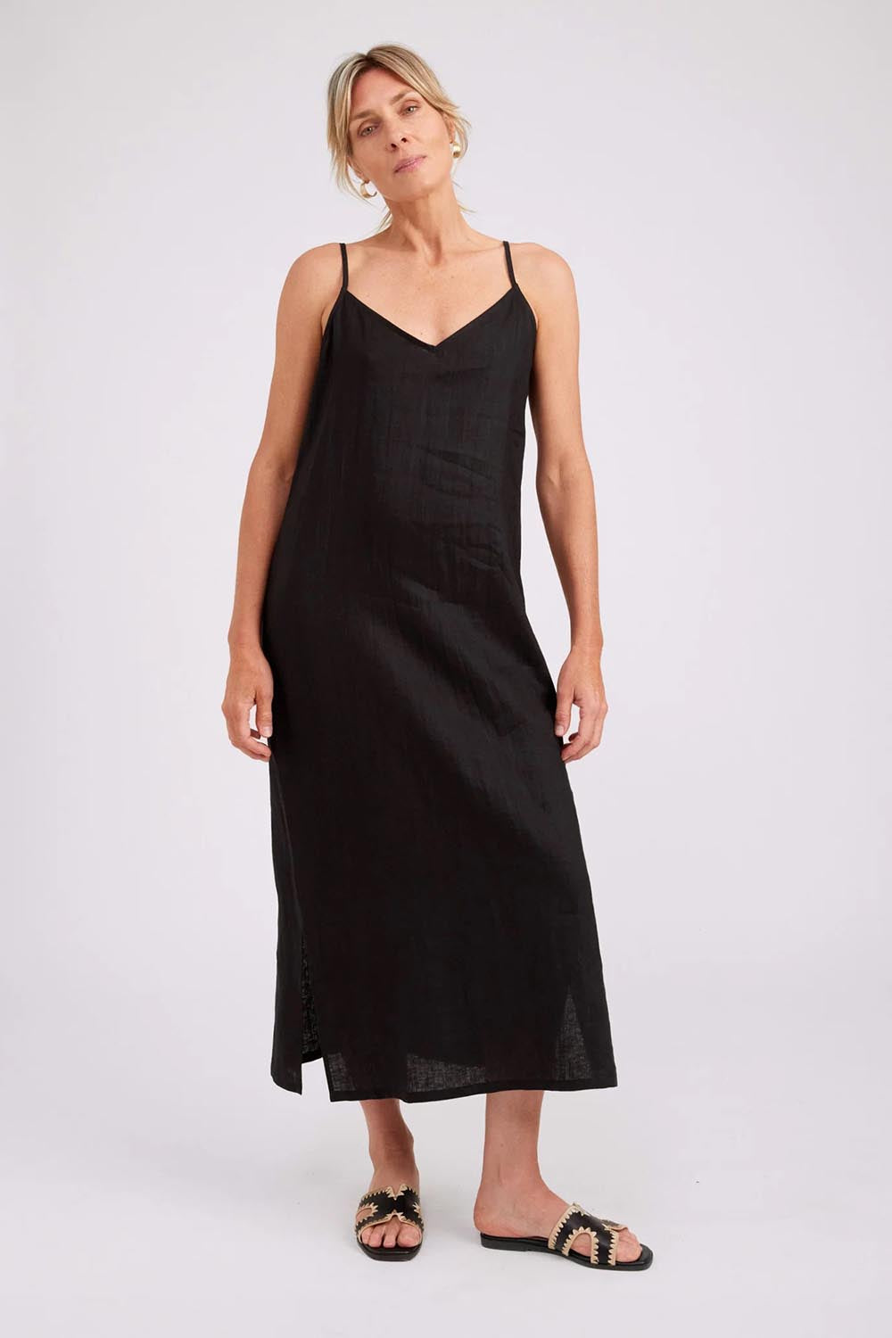 Model Genericm wearing size sample of the Studio Linen Tank Maxi Dress – Black in colour Black, from the front