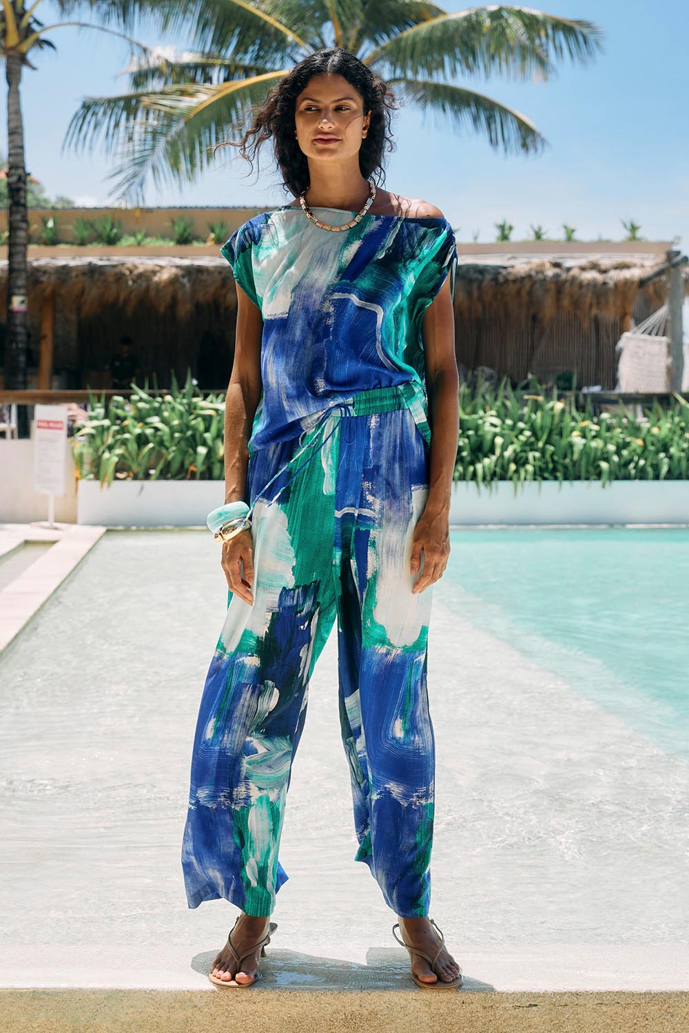 Model Genericm wearing size sample of the Palmera Pant – Seafoam in colour Seafoam, from the front