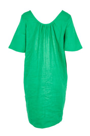 Product shot of the Cove Linen Dress – Jade in colour Jade, from the back