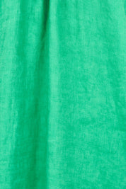 Product shot of the Cove Linen Dress – Jade in colour Jade, showing detail