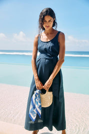 Model Genericm wearing size sample of the Cove Tank Maxi Dress – Indigo in colour Indigo, from the front