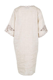 Product shot of the Maris Dress – Tusk in colour Tusk, from the back