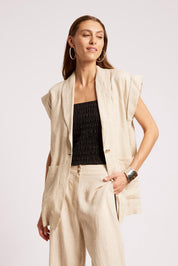 Model Genericm wearing size sample of the Maris Blazer Vest - Tusk in colour Tusk, from an angle