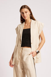Model Genericm wearing size sample of the Maris Blazer Vest - Tusk in colour Tusk, in a cropped view