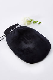 A model wearing size OneSize of the Tan Applicator Mitt in colour Natural, from the front, showing the whole outfit