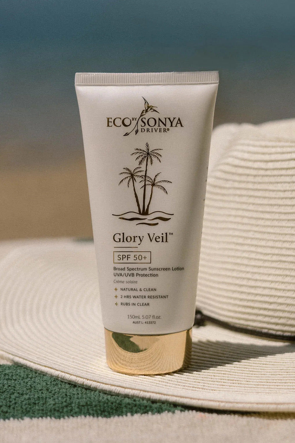 A model wearing the Glory Veil SPF 50+ in colour Gloryveil (White), from the front, showing the whole outfit