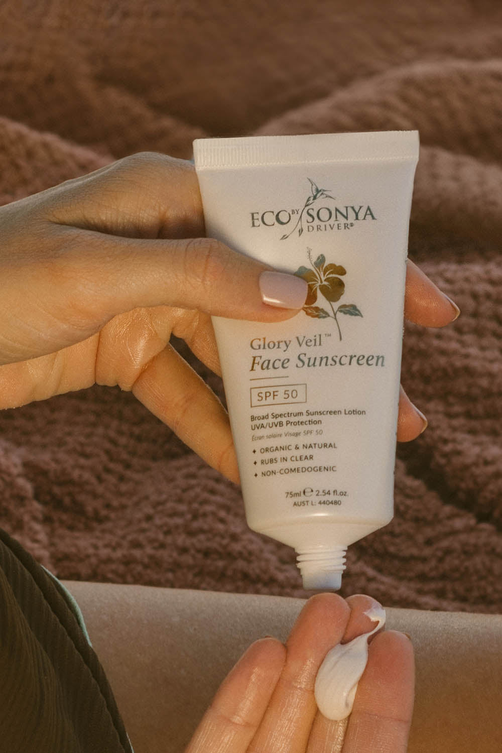 A model wearing the Glory Veil Face Sunscreen Spf 50 in colour White (White), from the front, showing the whole outfit