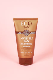 A model wearing the Organic Invisible Tan in colour Naturals, from the front, showing the whole outfit