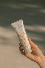 A model wearing the Hand & Nail Cream in colour Natural, from the front, showing the whole outfit