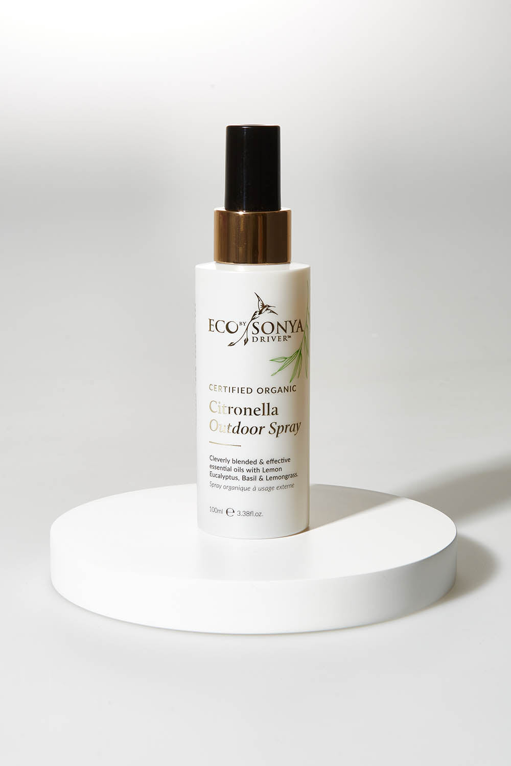 A model wearing size OneSize of the Organic Personal Outdoor Spray in colour Natural, from the front, showing the whole outfit