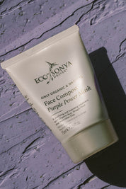 A model wearing the Face Compost Purple Power Mask in colour Natural, from the front, showing the whole outfit