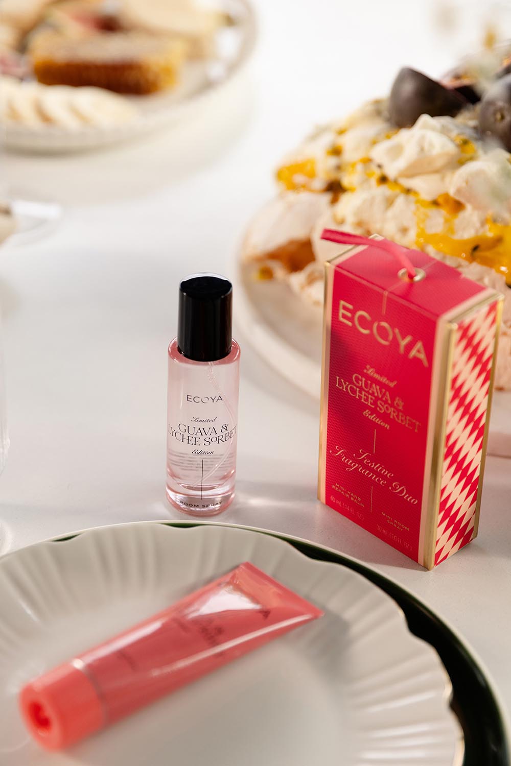 Product shot of the Festive Fragrance Duo Gift Set - Guavalychee in colour Guavalychee, from the front
