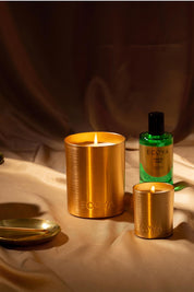 A model wearing the Goldie Candle in colour Freshpine (Green), from the front, showing the whole outfit