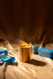 A model wearing the Mini Goldie Candle in colour Hibiscus (Blue), from the front, showing the whole outfit