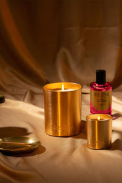 A model wearing the Mini Goldie Candle in colour Strawberry (Red), from the front, showing the whole outfit