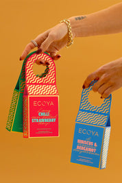 A model wearing the Festive Fragrance Duo in colour Freshpine (Green), from the front, showing the whole outfit