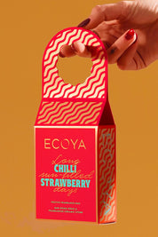 A model wearing the Festive Fragrance Duo in colour Strawberry (Red), from the front, showing the whole outfit