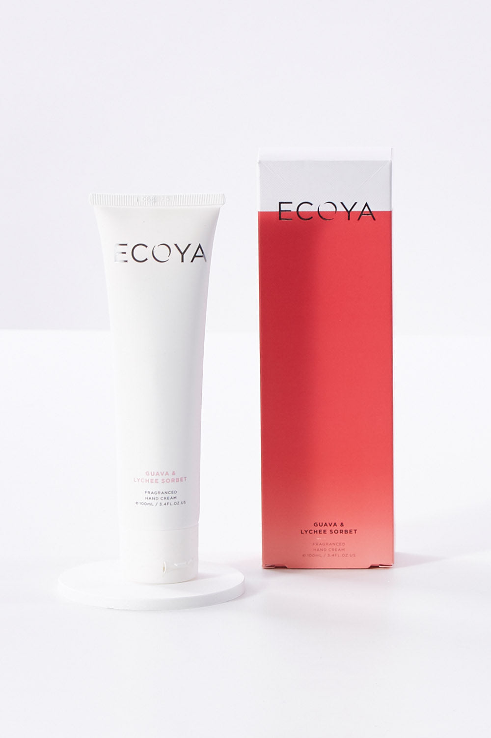 A model wearing size OneSize of the Guava And Lychee Hand Cream in colour Guava (Pink), from the front, showing the whole outfit