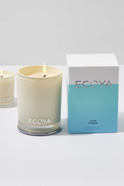 A model wearing the Madison Jar Lotus Flower Candle in colour Lotus (Blue), from the front, showing the whole outfit