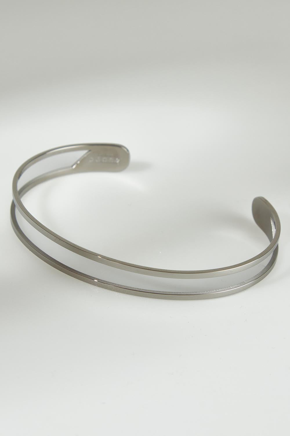 A model wearing the Faith Like A Mustard Seed Cuff Bracelet in colour Silver (Metallics), from the front, showing the whole outfit