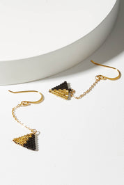 A model wearing size OneSize of the Be Light Beaded Earrings in colour Gold (Metallics), from the front, showing the whole outfit