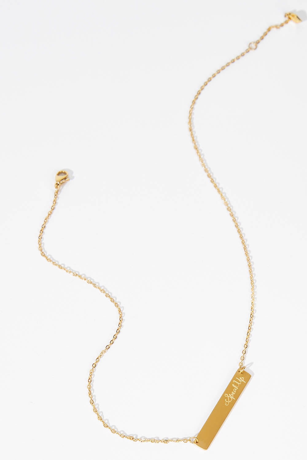 A model wearing size OneSize of the Speak Up Bar Necklace in colour Gold (Metallics), from the front, showing the whole outfit