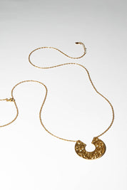 A model wearing size OneSize of the I Am Brave Necklace in colour Gold (Metallics), from the front, showing the whole outfit