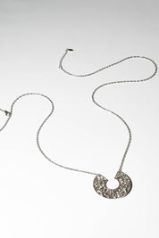 A model wearing size OneSize of the I Am Brave Necklace in colour Steel (Metallics), from the front, showing the whole outfit