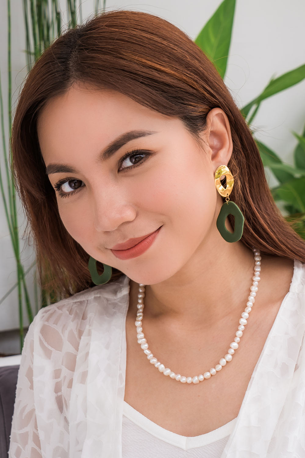 A model wearing the Milk And Honey Necklace in colour Gold (Metallics), from the front, showing the whole outfit