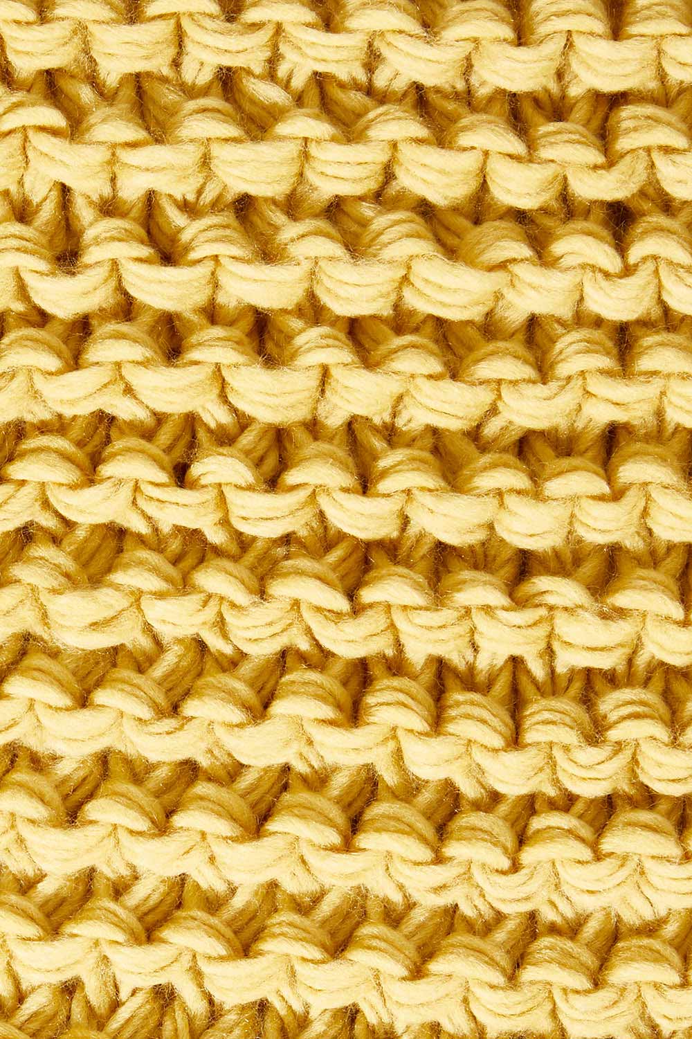 Product shot of the Organic Loop Scarf in colour Mustard, detail