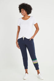 Model Aiyana wearing size 10 of the Wavelength Lounge Pant in colour Navy (Blue), from the front, showing the whole outfit