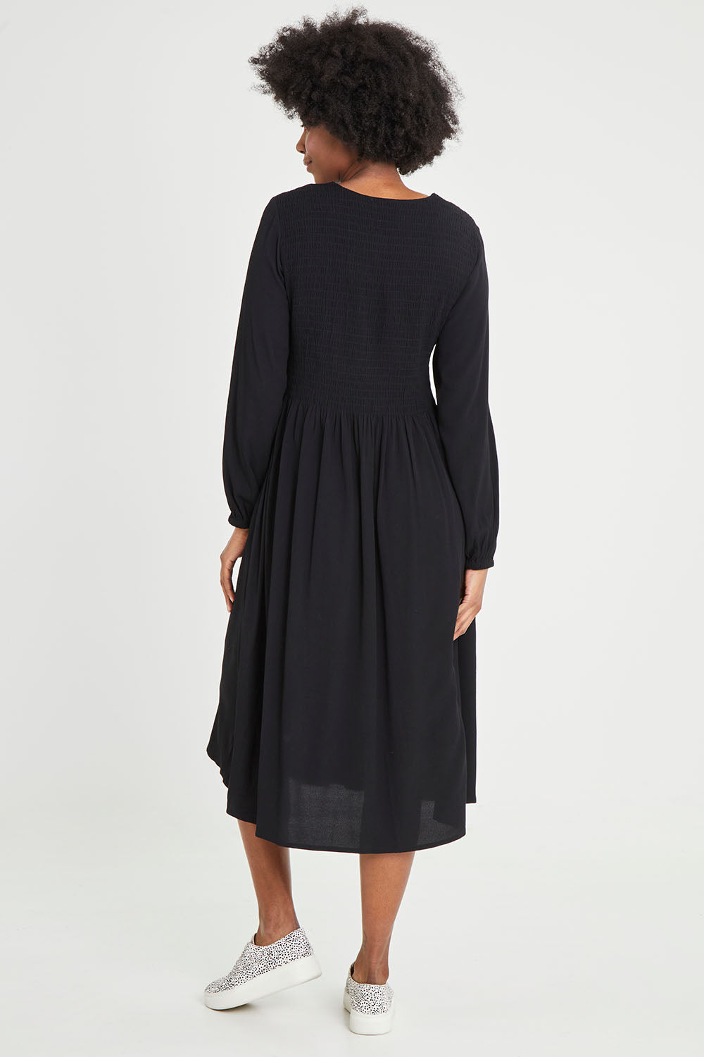 Model Aiyana wearing size 10 of the Lottie Midi Dress in colour Black (Black), from the back