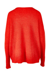 Product shot of the Verity V Neck Knit in colour Tangello (Red), from the back