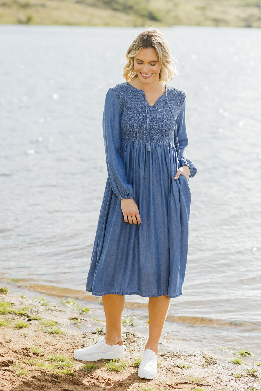 Model Alice wearing size 10 of the Jules Dress in colour Blue (Blue), from the front, showing the whole outfit