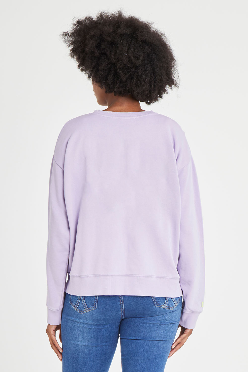Model Aiyana wearing size 10 of the Young At Heart Crew in colour Purple (Purple), from the back