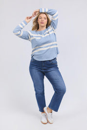 A model wearing the Allegra Long Sleeve Cotton Tee in colour Marshblue (White), from the front, showing the whole outfit