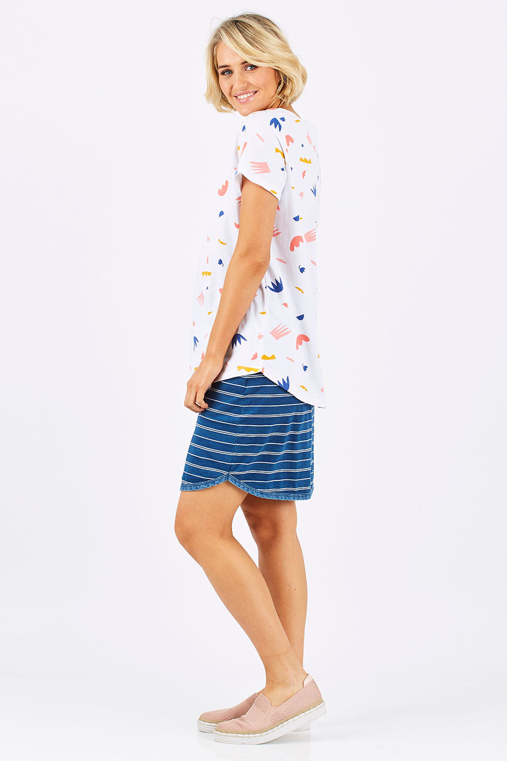 Model Emma wearing size 10 of the Go My Way Skirt in colour Chambray (Blue)